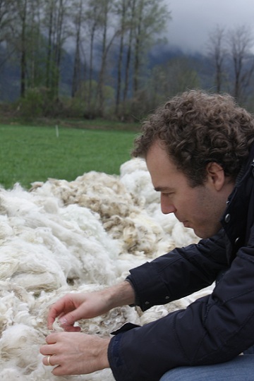 Roel checking the quality of the wool © Zizzz baby sleeping bags